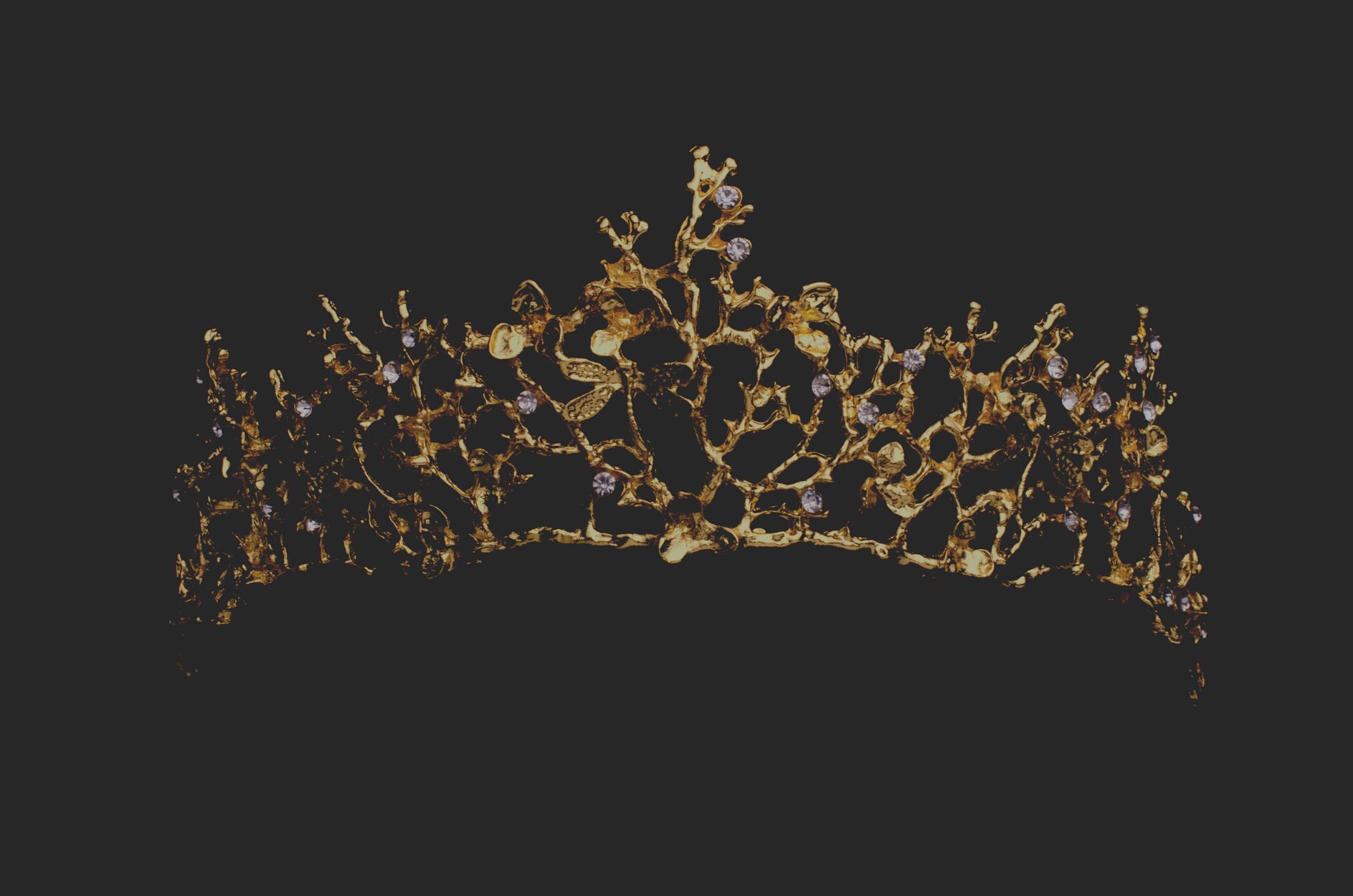 gold diadem with diamonds isolated on black